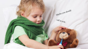 girl measures the temperature of a teddy bear